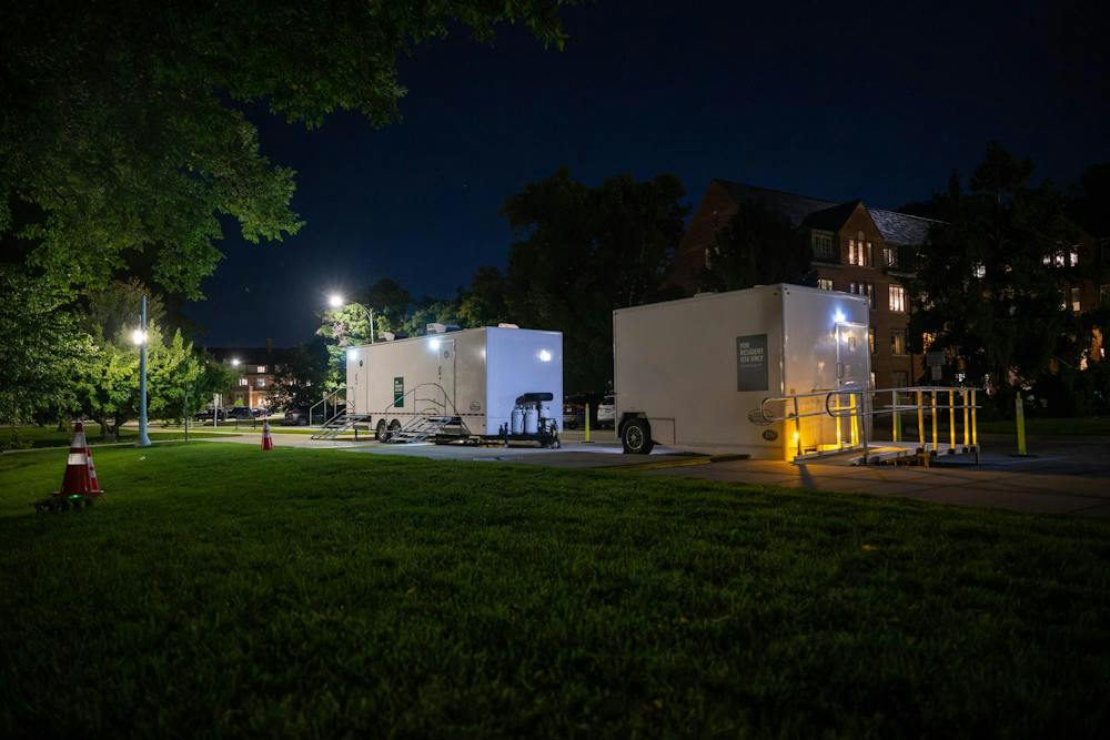 <p>Mobile shower units are brought on campus following a campuswide power outage at Michigan State University on Delta Ct in East Lansing, Mich., on Wednesday, Sept. 23, 2026. MSU announced mobile showers would be available for students in West Circle as hot water and steam restoration continues across campus.</p>