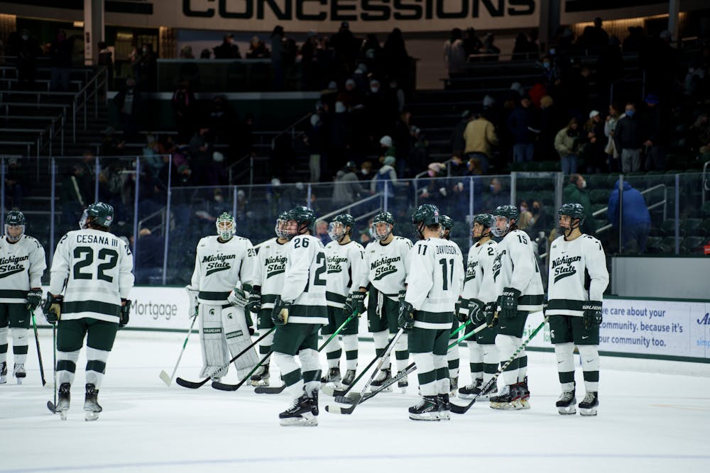 <p>Spartans gather around and get ready to prepare for game two tomorrow against Notre Dame after a one-point loss against Notre Dame on Feb. 18, 2022. Spartans lost 2-1 against Notre Dame.</p><p><br/><br/><br/><br/><br/><br/></p>