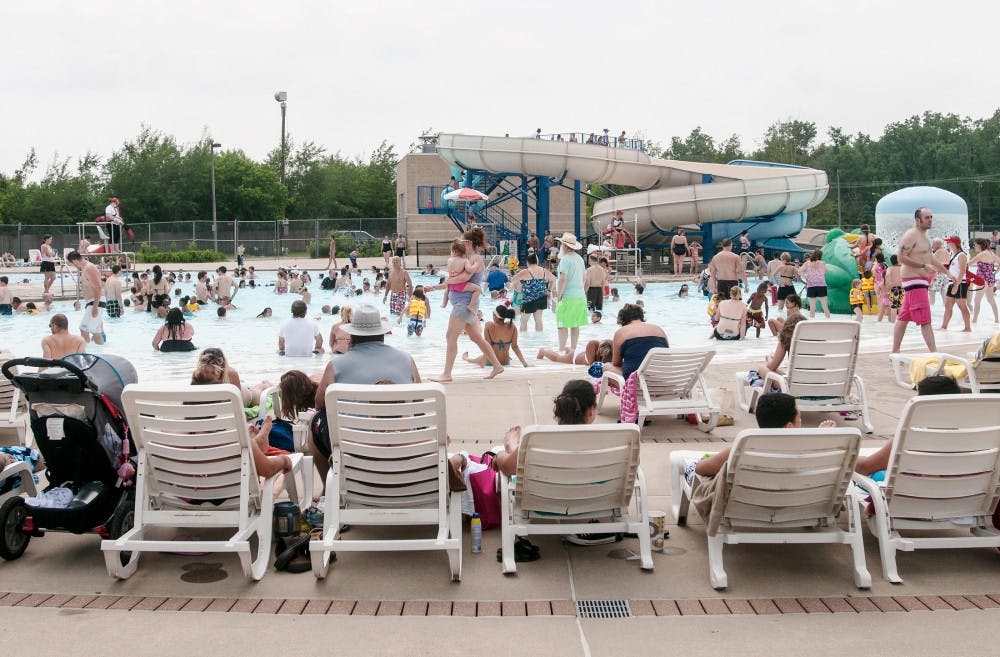 Residents from many different cites come to the East Lansing Family Aquatic Center to enjoy the great weather Monday, May 28, 2012.  Memorial weekend marked the center's opening for the summer season.  Adam Toolin/The State News