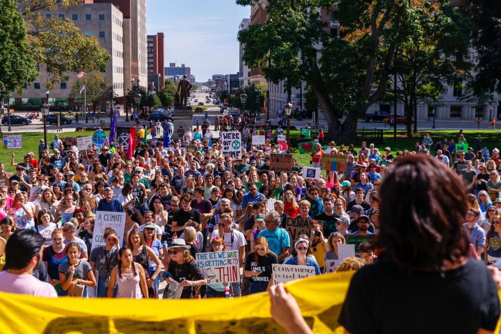 <p>The crowd at the Global Climate Strike listens to a speaker at the Capitol building in Lansing Sep. 20, 2019. The strike was part of a global movement started by young climate activist Greta Thunberg, that comes three days before the UN Climate Summit in NYC. </p>