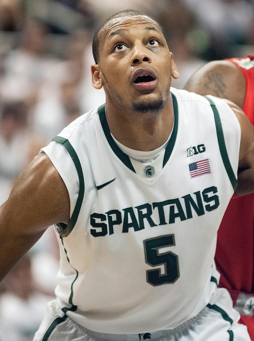 	<p>Junior center Adreian Payne awaits a rebound Saturday, Jan. 19, 2013, at Breslin Center. The Spartans defeated Ohio State 59-56, improving <span class="caps">MSU</span>&#8217;s record to 5-1 in the Big Ten. Adam Toolin/The State News</p>