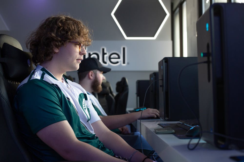 Brenden Hughens, front, a junior on Michigan State University's varsity Rocket League team, and Justin Frick, a freshman on the varsity Rocket League team, try out the new esports lounge following its debut in the Communication Arts and Sciences, Jan. 17, 2024. The new esports lounge is the second of its kind in the U.S. and the first in the Big Ten and is open for use by all students on campus. 