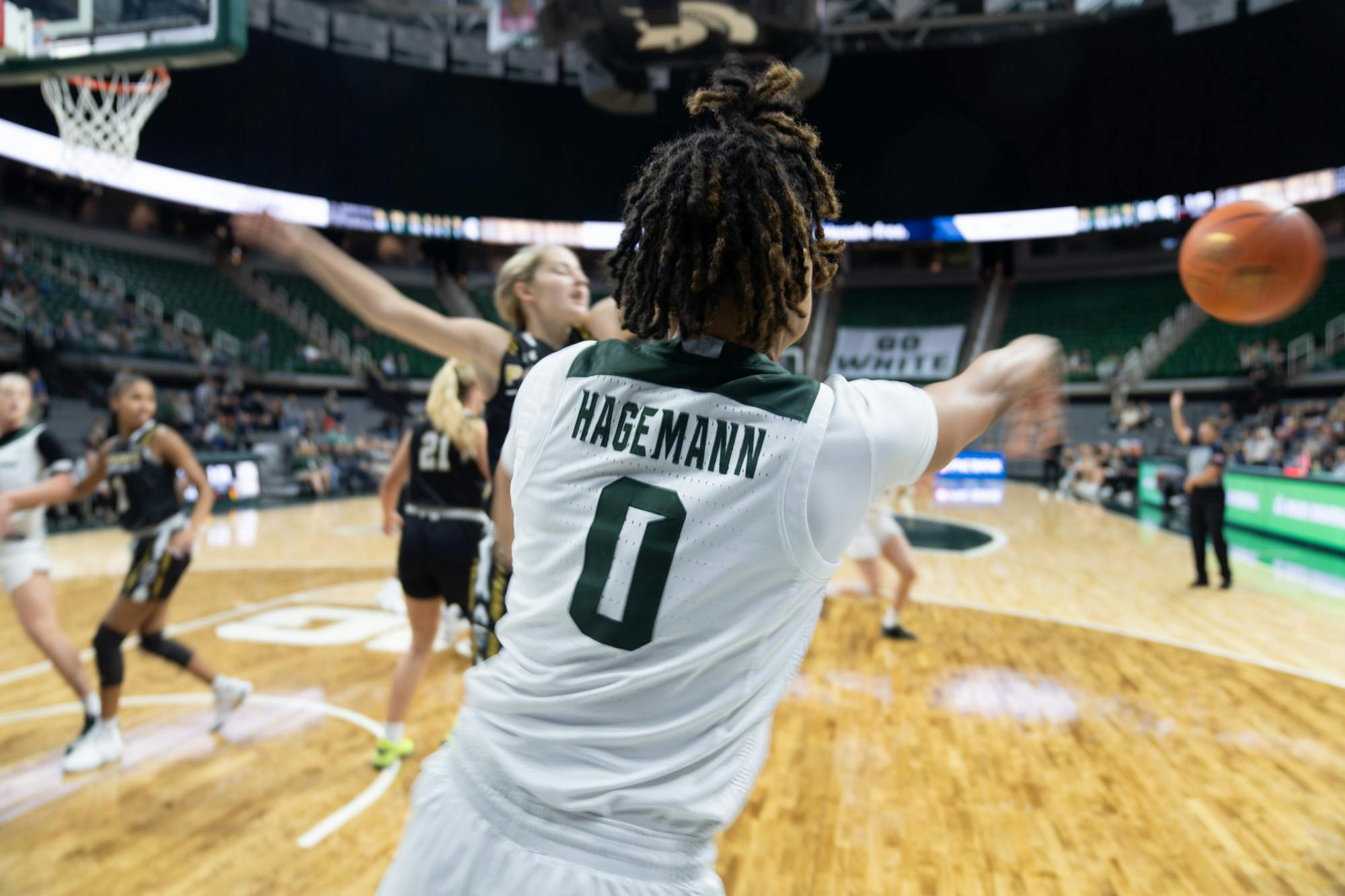 Sophomore guard Deedee Hagemann (0) makes a throw-in during a game against Purdue Fort Wayne at Breslin Center on Nov. 10, 2022. The Spartans defeated the Mastodons with a score of 85-53. 