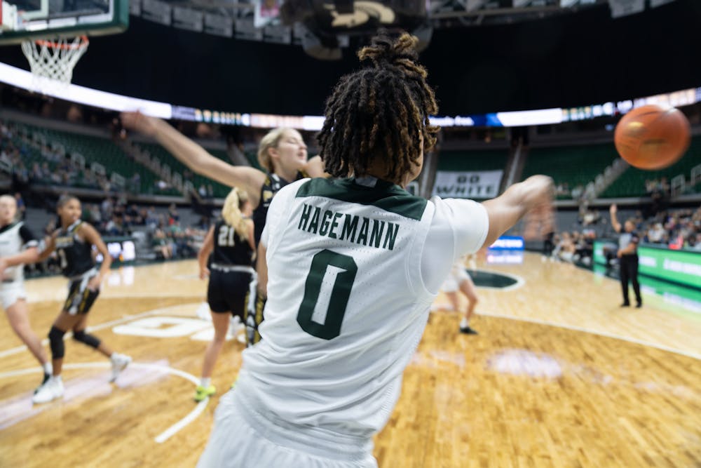 Sophomore guard Deedee Hagemann (0) makes a throw-in during a game against Purdue Fort Wayne at Breslin Center on Nov. 10, 2022. The Spartans defeated the Mastodons with a score of 85-53. 
