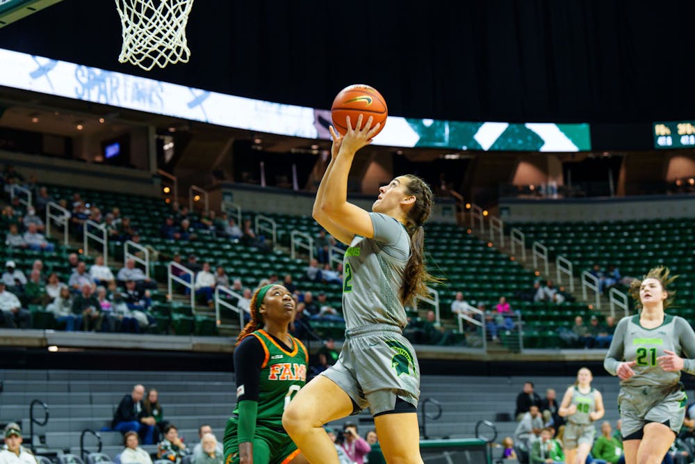 <p>Freshman guard Abbey Kimball (2) shoots a basket during a matchup against Florida A&amp;M, held at the Breslin Center on Nov. 17, 2022. The Spartans defeated the Rattlers 109-44.</p>