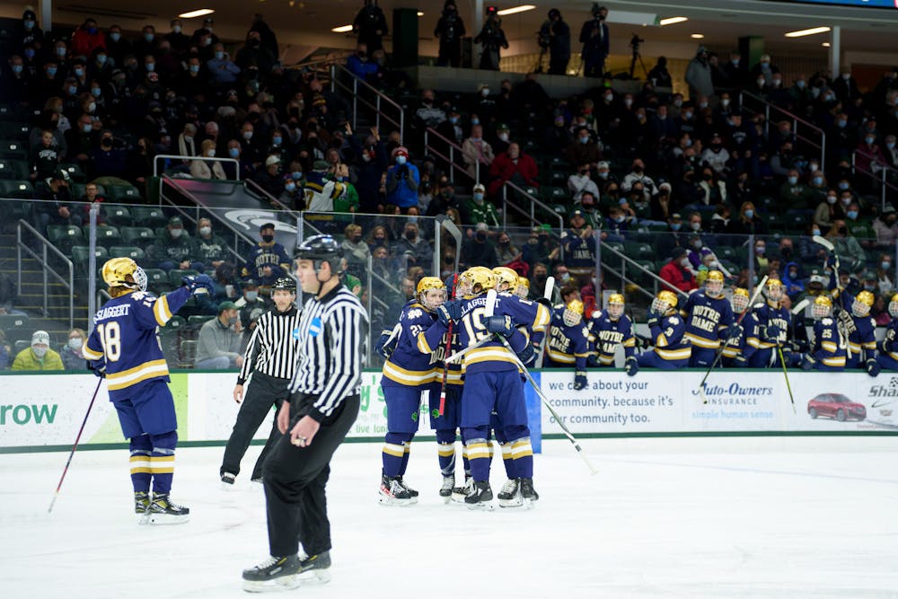 <p>Notre Dame celebrating after freshman Hunter Strand scores Notre Dames first goal of the night on Feb. 18, 2022. Spartans lost 2-1 against Notre Dame.<br/><br/><br/><br/></p>