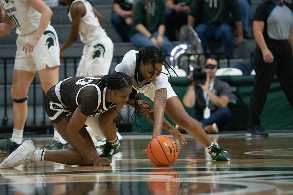 <p>Junior Guard Gabby Elliott trying to save the ball at the Western Michigan vs. MSU game held at the Breslin Center on November 13. The Spartans defeated the Broncos 97-49.</p><p><br/><br/><br/></p>