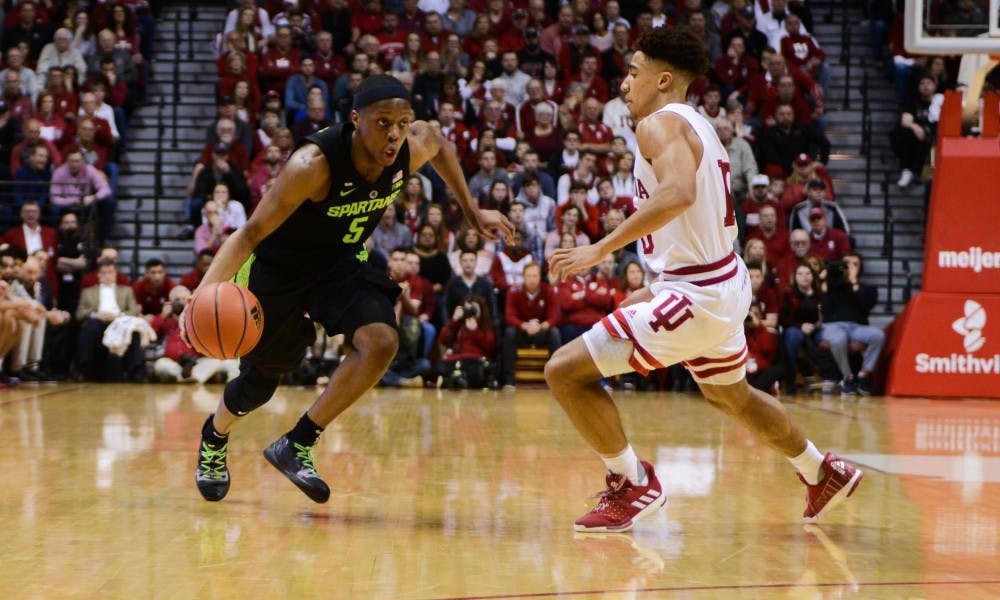 Junior guard Cassius Winston (5) dribbles the ball up the court during the game against Indiana at the Bloomington Assembly Hall Mar. 2, 2019. The Spartans fell to the Hoosiers, 63-62.