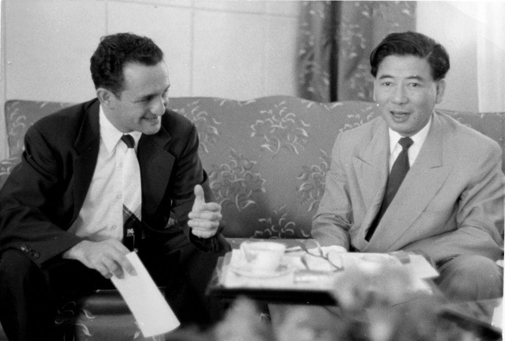 <p>MSU professor Wesley Fishel, left, and Ngo Dinh Diem, right, converse together in 1955. Fishel became Diem’s personal political adviser when the latter took power in South Vietnam in the 1950’s. Image courtesy of MSU University&nbsp;Archives and Historical Collections.</p>