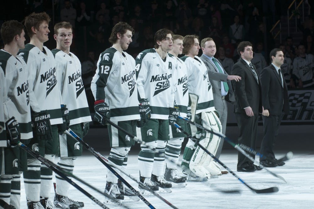 The Spartan seniors stand together after the game against Ohio State on March 12, 2016 at Munn Ice Arena. The Spartan seniors were honored after the game in honor of senior night.  