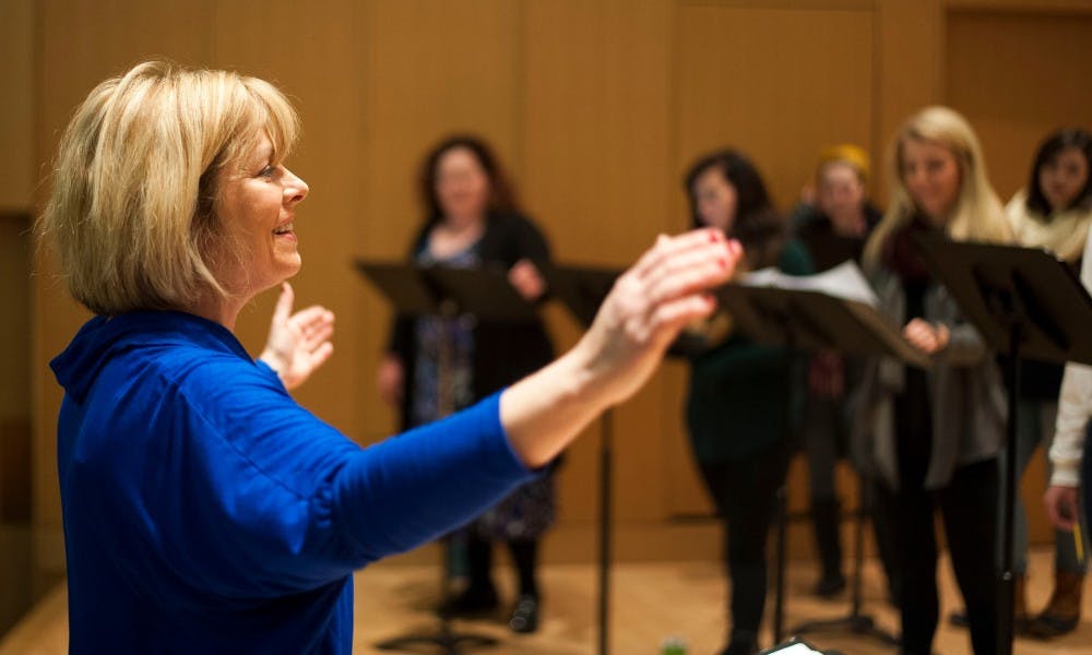 Professor of Choral Conducting and Music Education Dr Sandra Snow conducts the choir during a women's choir rehearsal on Feb. 11, 2016 at the Music Building. Snow is one of the honorees of the Beal Outstanding Faculty Awards this year.