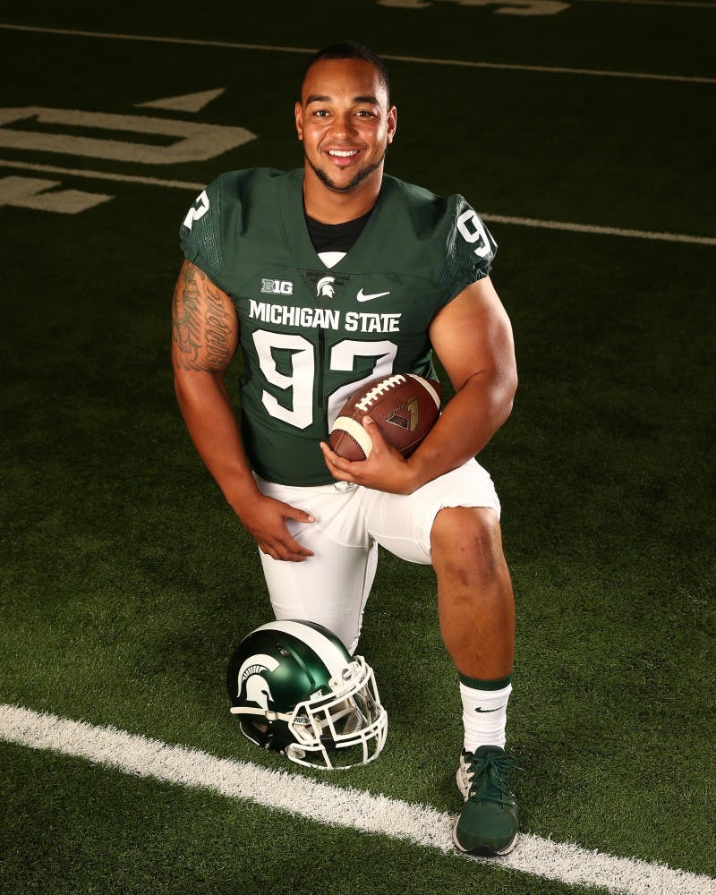 <p>Sixth-year senior and transfer Kevin Williams poses for a photo in his new Spartan jersey. Williams, a defensive tackle, transfers to MSU from Nebraska. Photo courtesy of MSU Athletic Communications.</p>