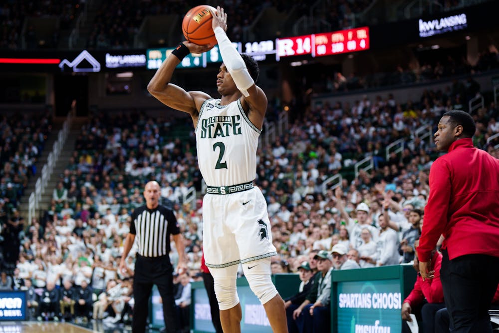 <p>Senior guard Tyson Walker (2) shoots a three point basket during a matchup against Rutgers, held at the Breslin Center on Jan. 19, 2023. The Spartans defeated the Scarlet Knights 70-57.</p>