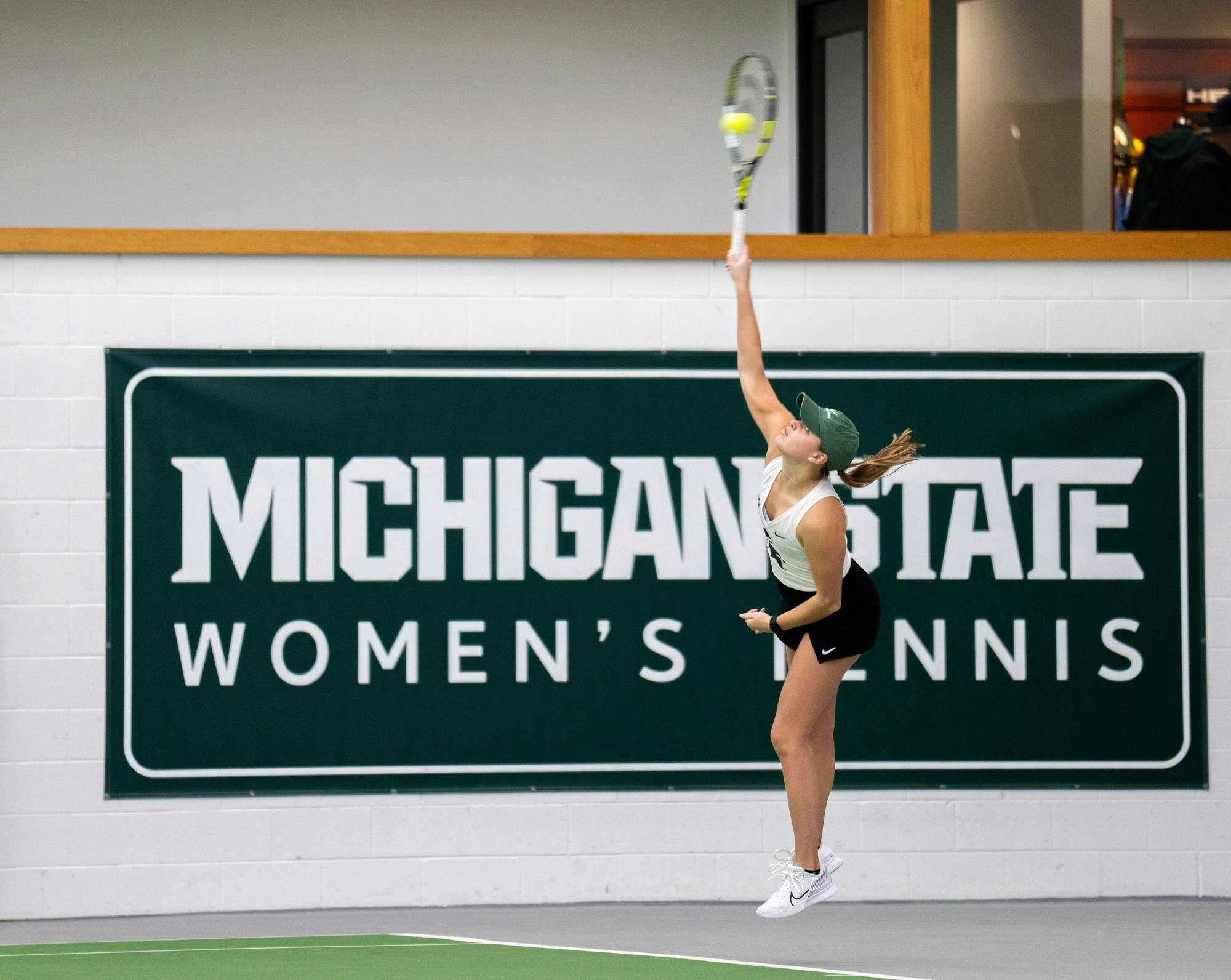 <p>Michigan State sophomore Natalie Stasny hits a serve to Ohio State at the MSU Tennis Center in Lansing, Michigan on March 16, 2025. The Buckeyes won 4-0 and are 23-2 overall against the Spartans since the first time they met in 2001.</p>
