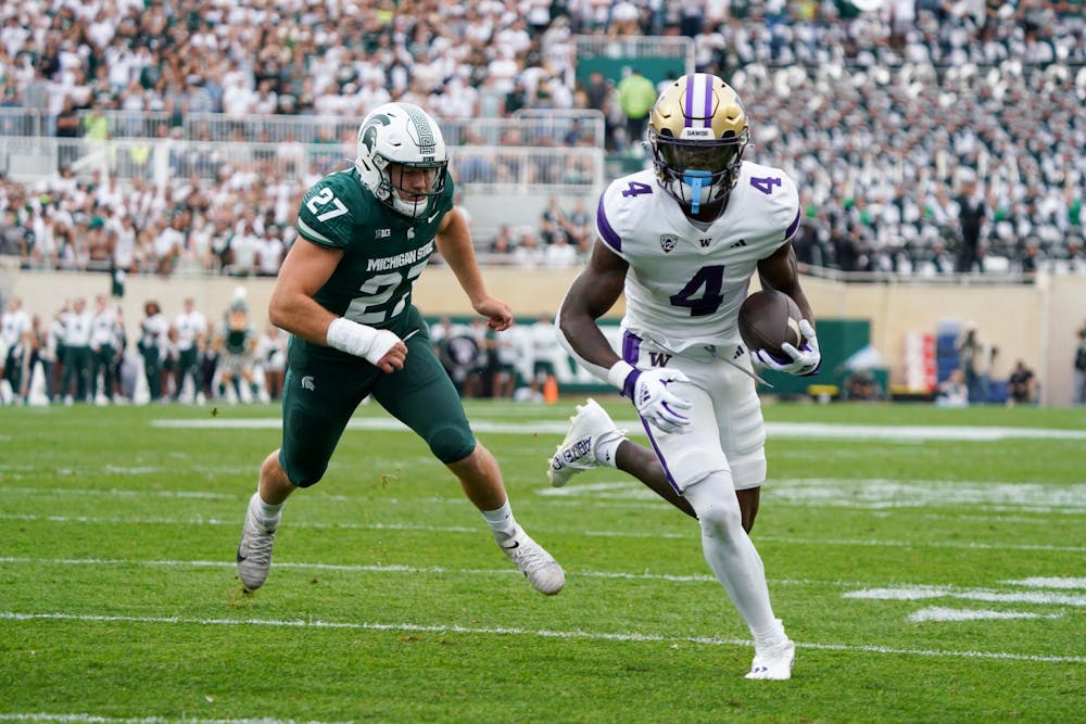 Redshirt junior linebacker Cal Haladay (27) chases a University of Washington player during a game at Spartan Stadium on Sept. 16, 2023.