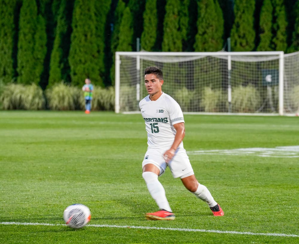 <p>Michigan State’s midfielder, Jacob Cromer maintained the ball during the match-up against Indiana University at DeMartin Soccer Field on Sept. 22, 2023.</p>