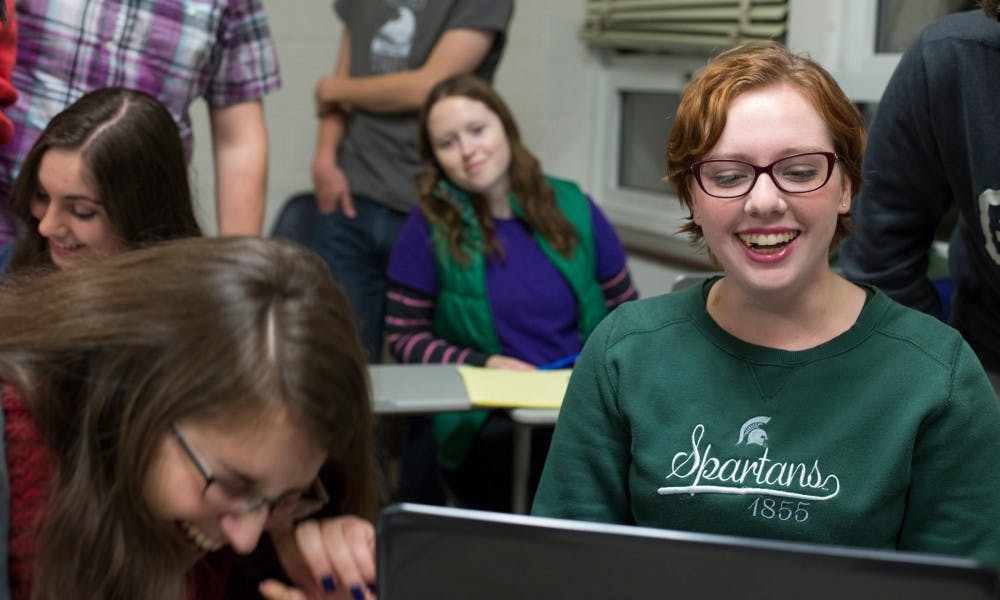 Political science sophomore Samantha Perry watches a video during the quiz bowl team's practice on Nov. 19, 2015 at Berkey Hall.