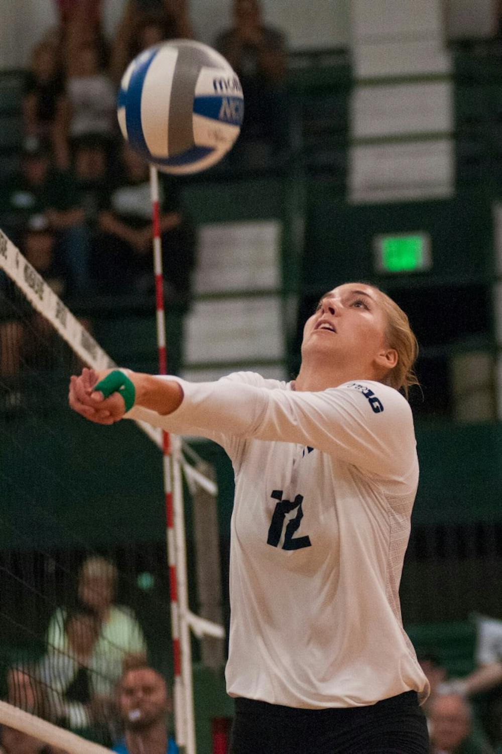 Junior setter Rachel Minarick (12) bumps the volleyball during the volleyball game against Notre Dame on Sept. 16, 2016 at Jenison Field House. The Spartans defeated the Fighting Irish, 3-0.