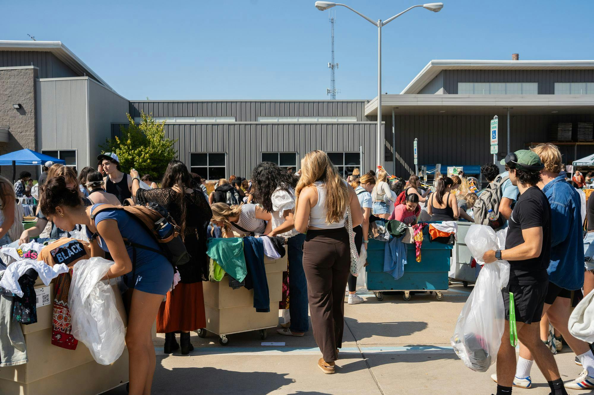 <p>Students gather, thrift and converse, at the student thrift event at MSU’s surplus event in East Lansing, Michigan, on Sept. 17, 2025.</p>