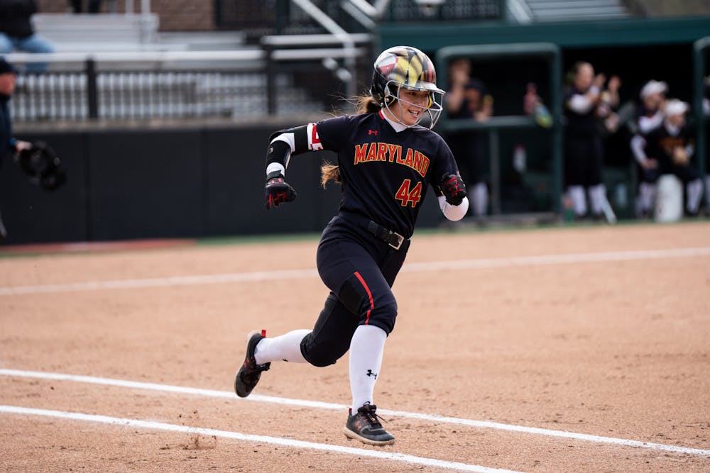 <p>Maryland player Megan Mikami rushes to first base after a hit during the match on April 29th, 2022. </p>