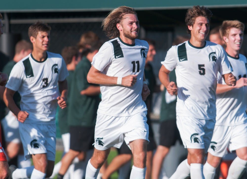 	<p>Senior defender Kevin Cope, 3, junior defender Ryan Keener, 11, and senior defender Ryan Thelen, 5,  run off the field after defeating Oregon State on Sept. 6, 2013, at DeMartin Stadium at Old College Field. The Spartans defeated the Beavers, 1-0. Georgina De Moya/The State News</p>