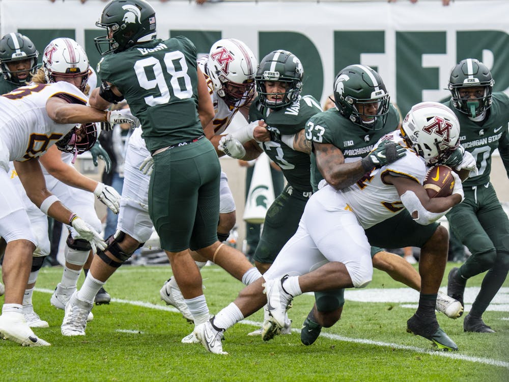 <p>Senior cornerback Kendell Brooks, 33, fails to stop Minnesota’s Mohamed Ibrahim for a Gopher touchdown during Michigan State’s match against Minnesota on Saturday, Sept. 24, 2022.</p>