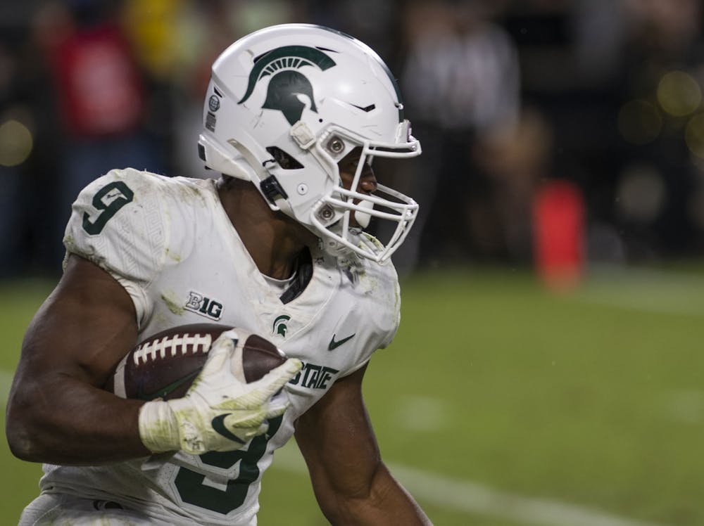 <p>Spartan junior running back Kenneth Walker (9) in MSU&#x27;s match against the Purdue Boilermakers at Ross-Ade Stadium in West Lafayette on Saturday, Nov. 6, 2021.</p>