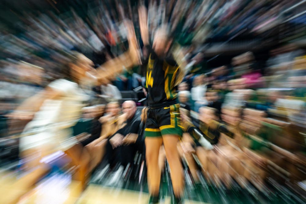 <p>Wayne State University senior forward Ally Shagena (14) attemps to score during MSU's season-opening exhibition game against Wayne State University at the Breslin Center on Oct. 28, 2024. The Spartans beat the Warriors, 101-40.</p>