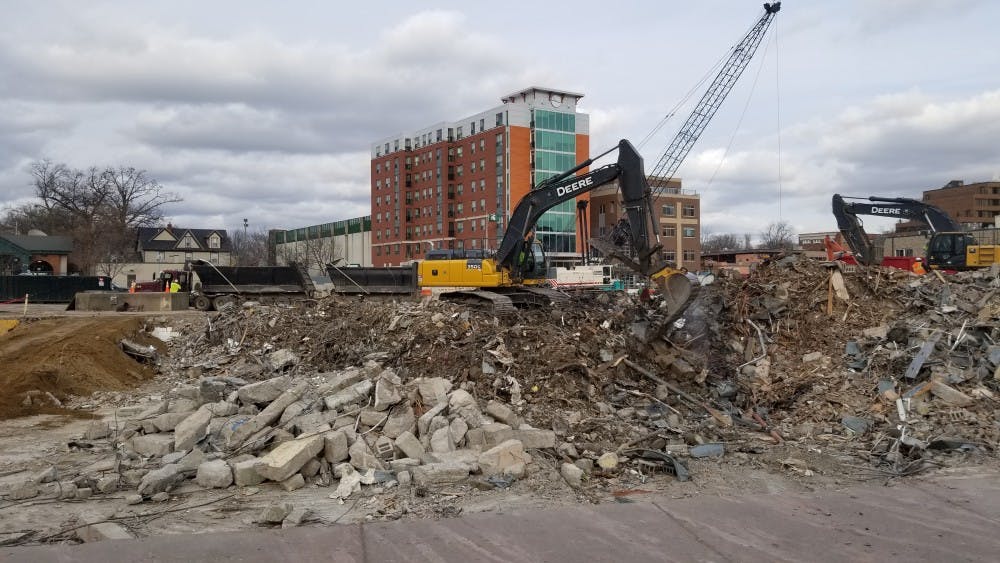 Demolition of buildings along Grand River Ave continues on December 5, 2017. 