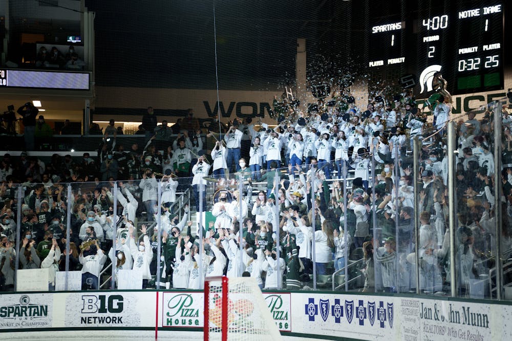 <p>The Michigan State hockey student section erupts as the marching band finishes their performance after the second period on Feb. 18, 2022. Spartans lost 2-1 against Notre Dame.</p><p><br/><br/><br/><br/><br/><br/></p>