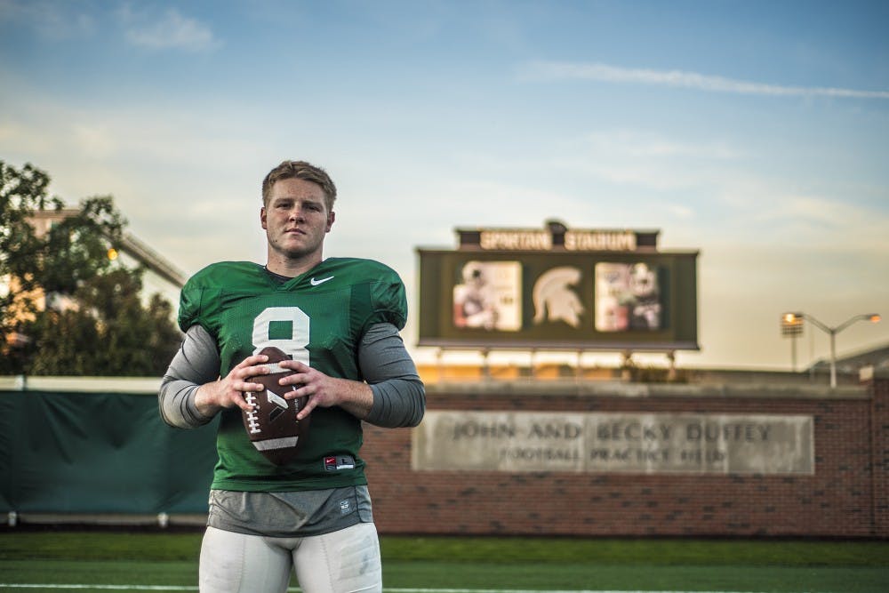 Senior kickoff specialist Brett Scanlon (8) poses for a portrait after practice on Oct. 17, 2017 at the Duffy Daugherty Football Building.