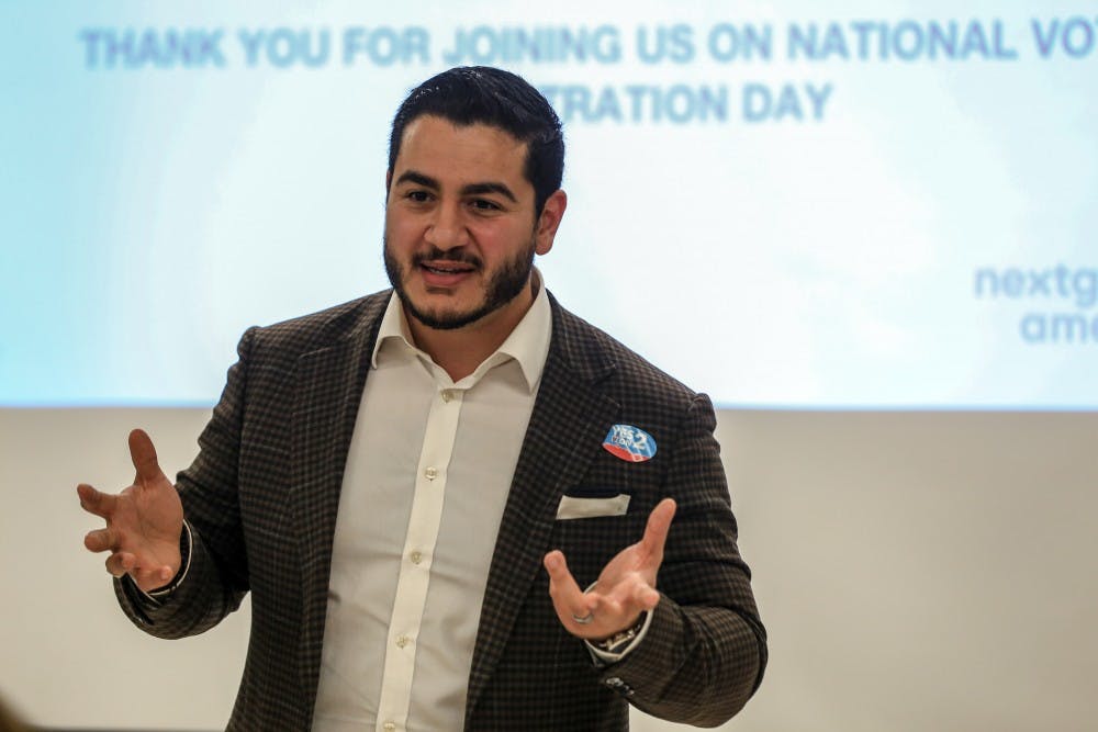 Community members listen to Abdul El-Sayed at Wells Hall on Sept. 25, 2018.