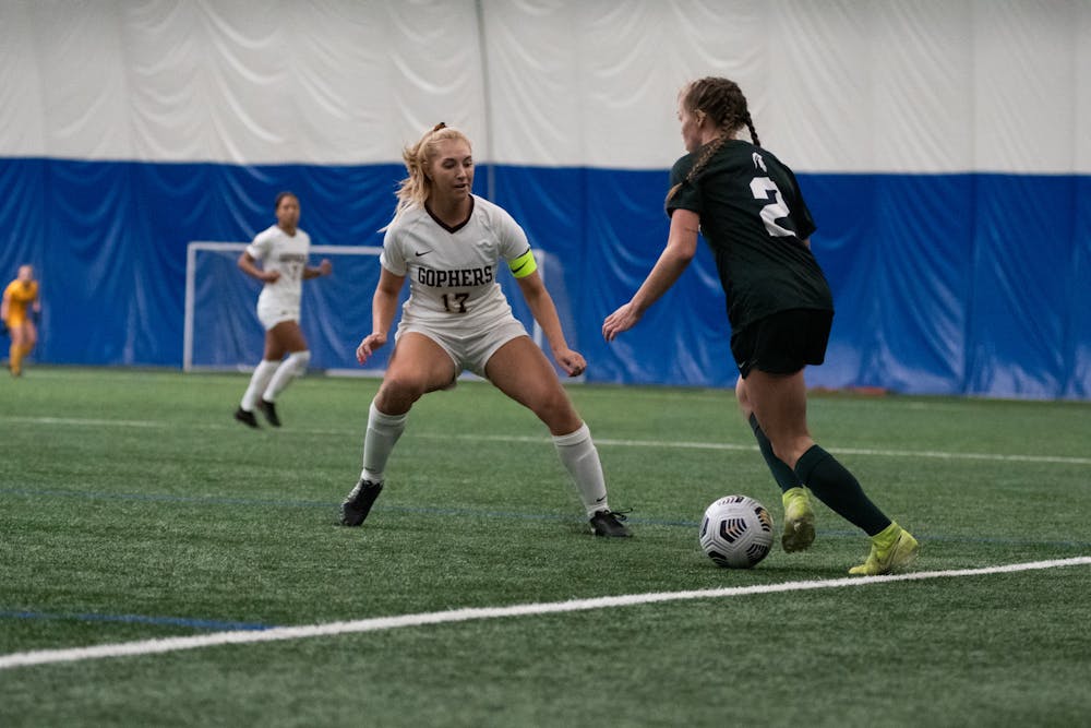 <p>Minnesota&#x27;s Celina Nummerdor (17) guards Michigan State&#x27;s Paige Webber (2) in the Spartans&#x27; loss on March 1, 2021.</p>