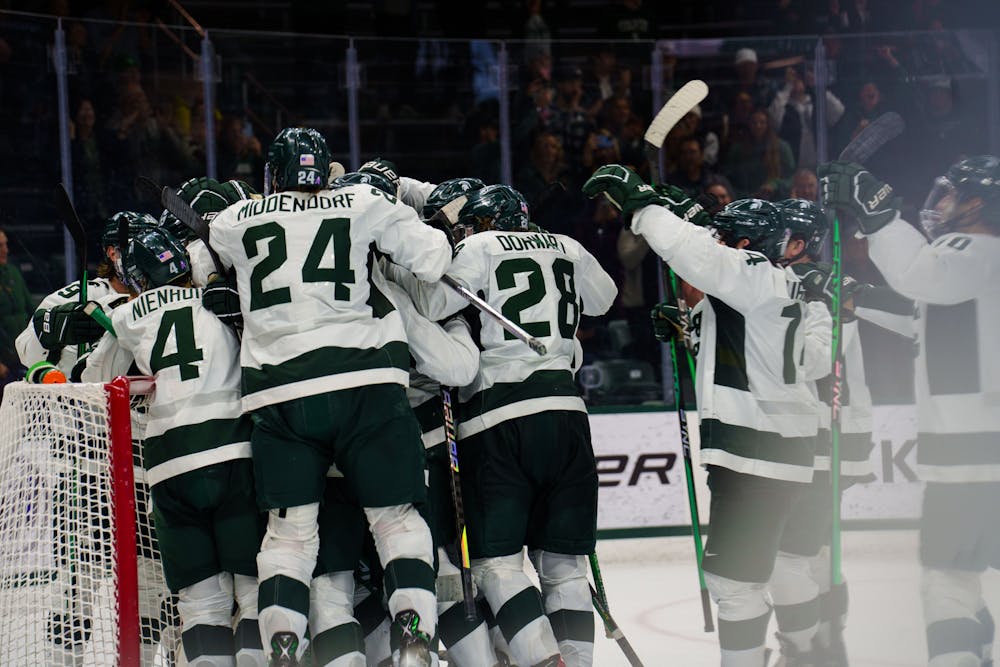 <p>Michigan State men&#x27;s hockey celebrates after a win over Ohio State in the second game of a two game series, hosted at Munn Ice Arena on Nov. 11, 2022. The Spartans defeated the Buckeyes 4-3.</p>