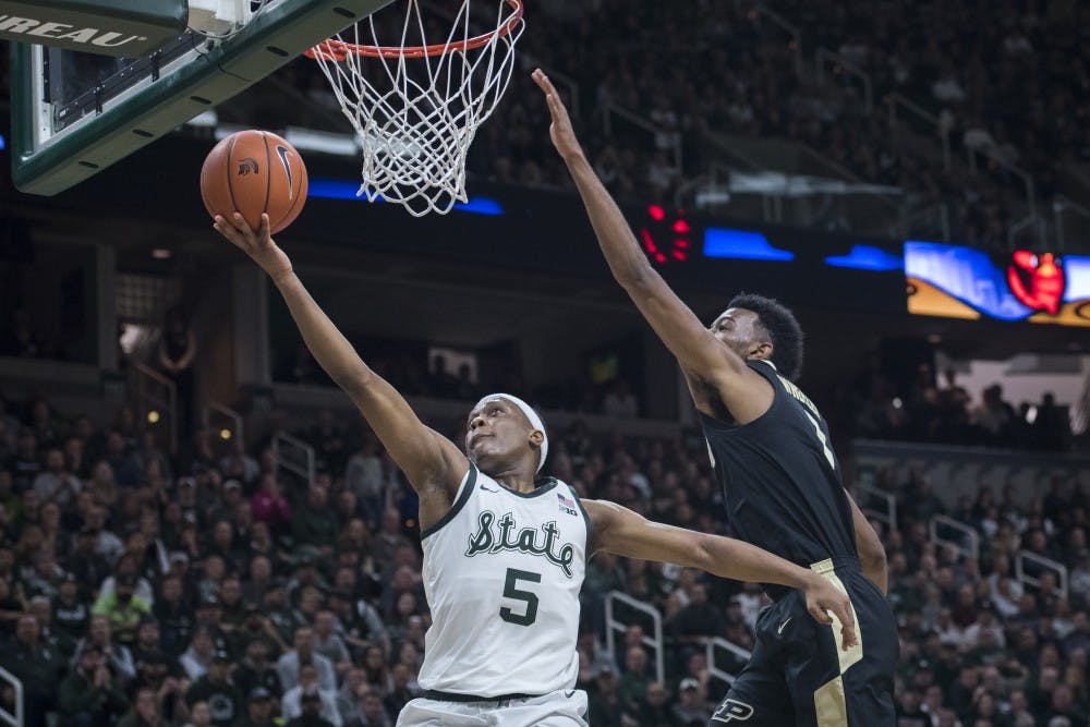 Junior guard Cassius Winston (5) shoots a layup during the second half of the men's basketball game against Purdue on Jan. 8, 2018 at Breslin Center. The Spartans defeated the Boilermakers, 77-59.