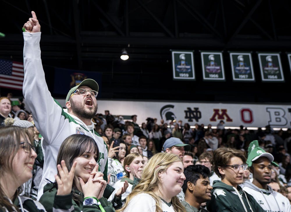 <p>Spartan fans yell after Ohio State scored against Michigan State during overtime in the Munn Ice Arena on March 14, 2026.</p>