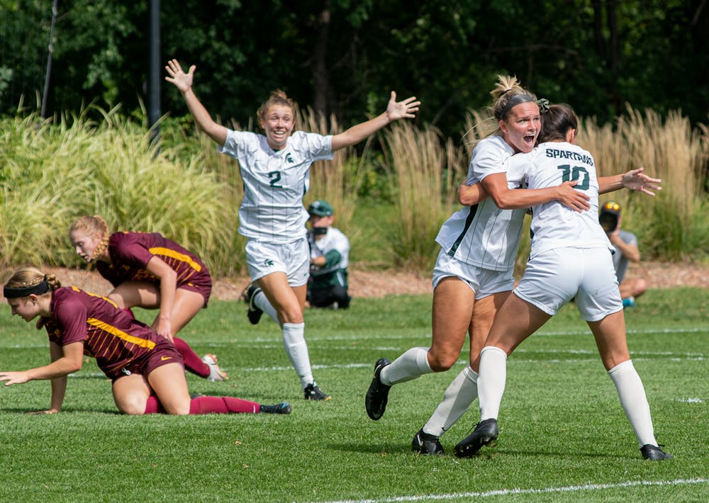 <p>Sophomore forward Mj Andrus celebrates her go-ahead goal with her team. The Spartans defeated the Gophers 2-1 on Sept. 26, 2021.</p>