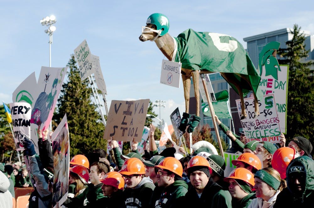 Fans brought signs and other oddities to show their spirit on Saturday morning during ESPN's "College GameDay" at Munn Field on Oct. 22, 2011. State News File Photo