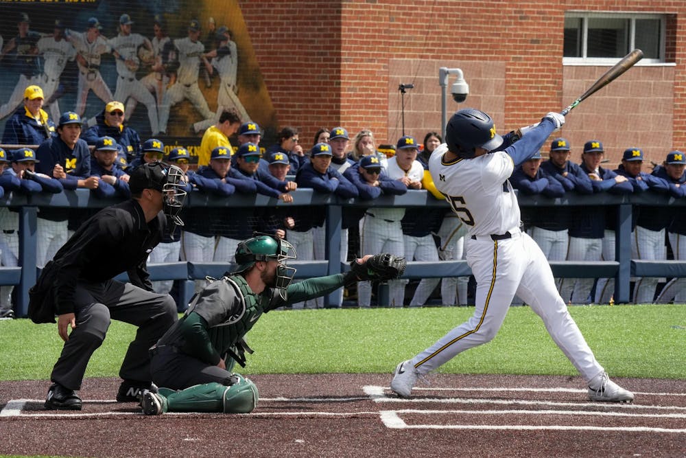 Michigan State graduate student catcher Caleb Berry (31) catches the ball after a Michigan player swings and misses on April 26, 2025. The Spartans lost to the Wolverines in the second game 9-2.