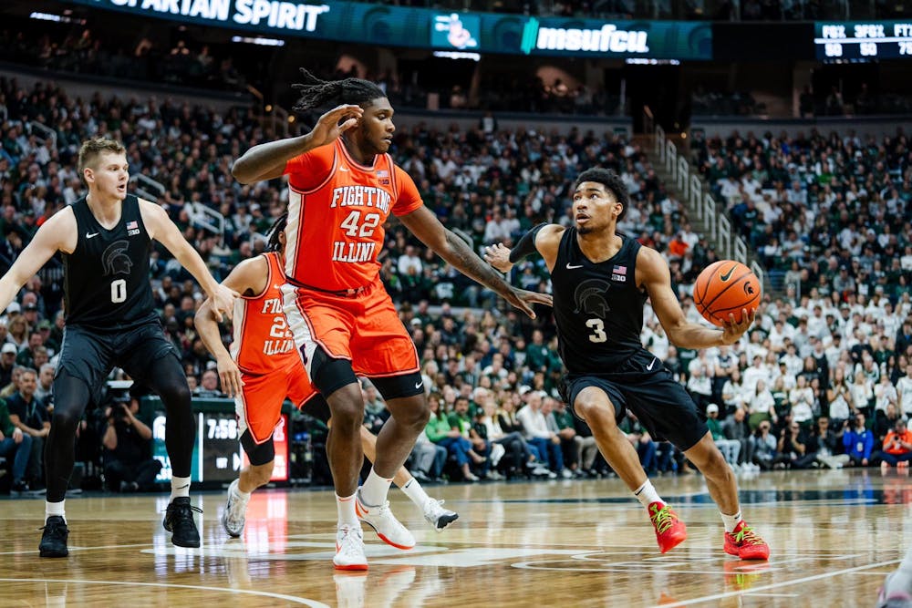 <p>Spartan junior guard Jaden Akins (3) gazes up to the basket during a game against the University of Illinois at the Breslin Center on Feb. 10, 2024. Michigan State beat the University of Illinois 88-80.</p>