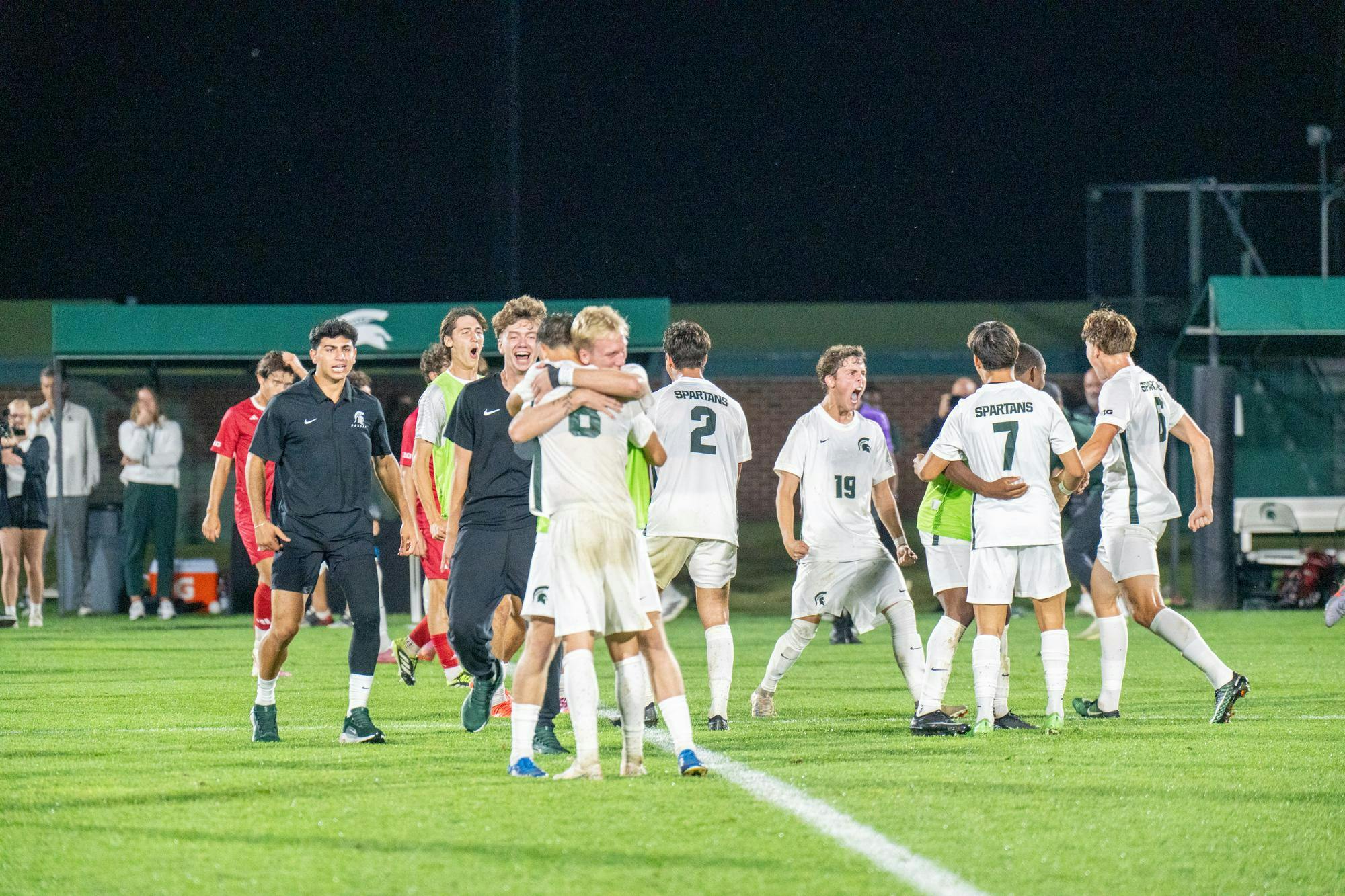 The Spartan soccer team celebrates after a victory against Indiana at DeMartin Stadium in East Lansing, Mich., Tuesday, Sept. 23, 2025.