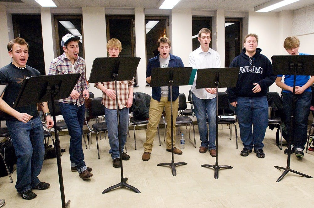 	<p>Members of the Spartan Dischords sing their version of the song &#8220;I Believe In A Thing Called Love&#8221; at their practice on Feb. 22, 2011. The group is preparing for their belated valentines day show taking place this Friday at 7:30pm at the Wharton Center&#8217;s Pasant Theatre. State News File Photo</p>