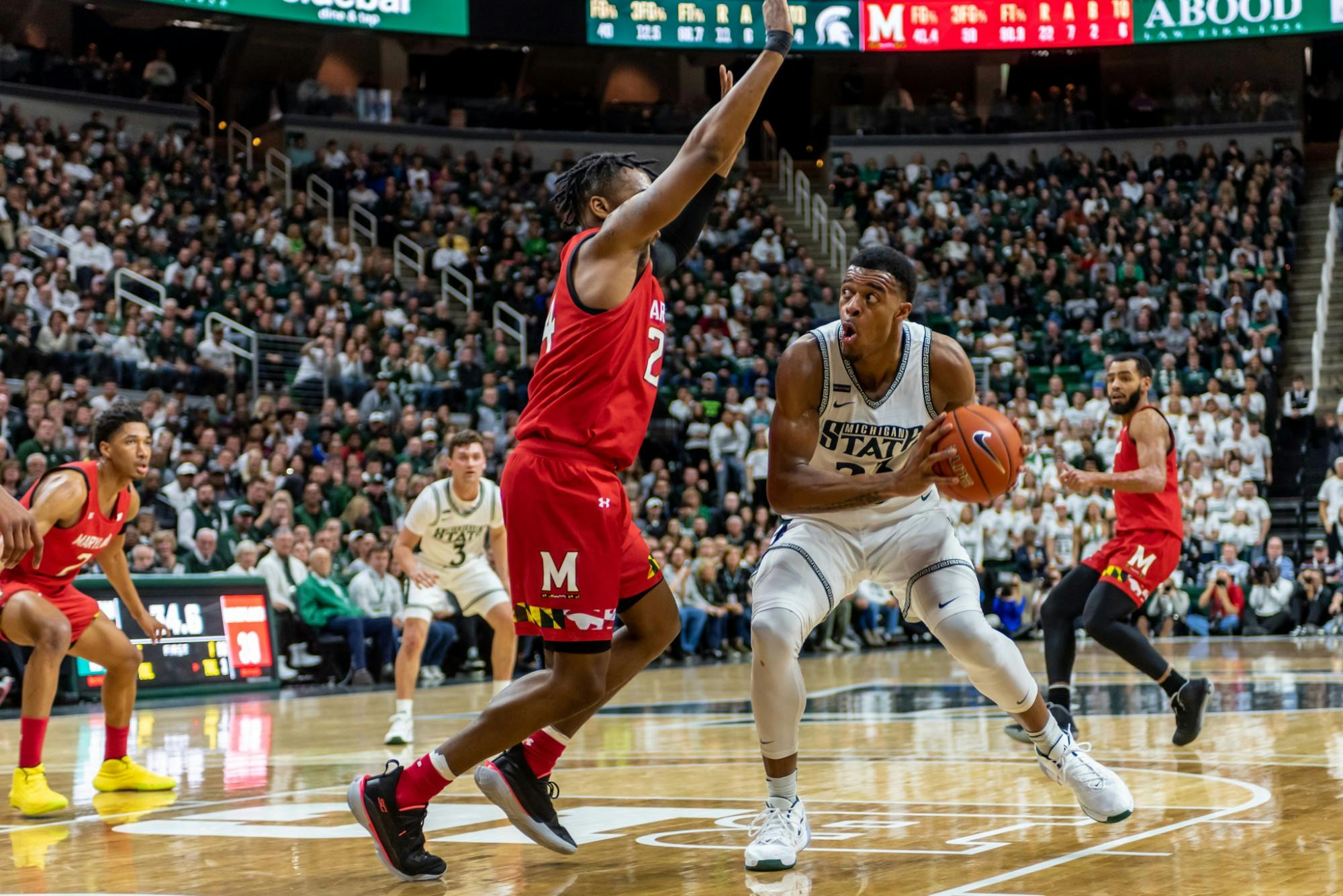 <p>Junior forward Xavier Tillman (right) is defended by Maryland’s Donta Scott (left). The Spartans fell to the Terrapins, 60-67, at the Breslin Student Events Center on Feb. 15, 2020. </p>