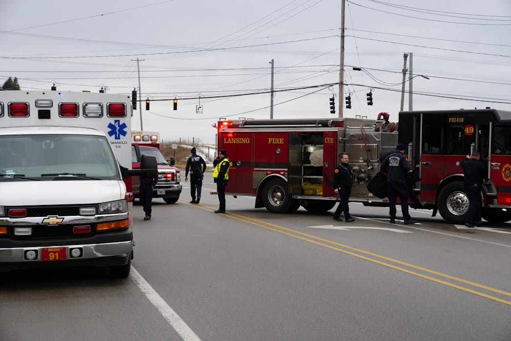 <p>Emergency services respond to a school shooting call at Okemos High School on Feb. 7, 2023. Okemos was one of multiple schools who received calls though no shots were fired at any schools, police say.</p>