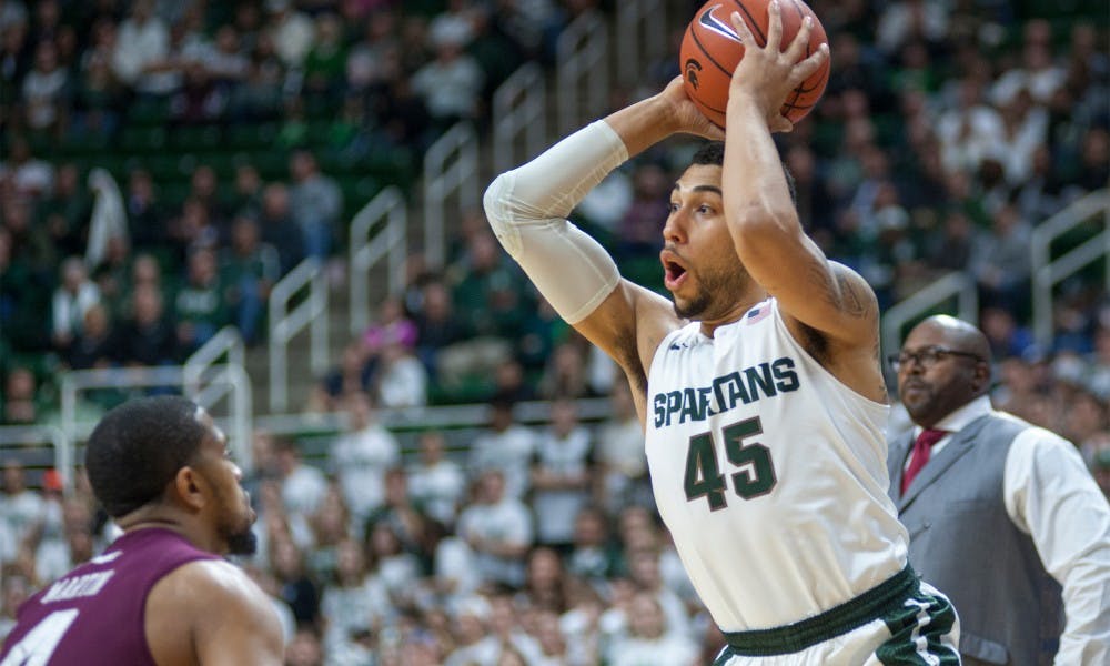 Senior guard Dezel Valentine looks to pass the ball during the first half of the men's basketball game against Maryland Eastern Shore on Dec. 5, 2015 at the Breslin Center. The Spartans defeated the Hawks, 78-35.