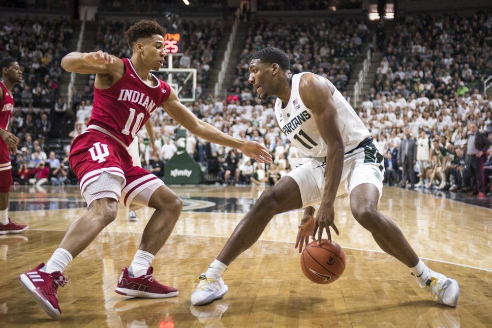 <p>Then-freshman forward Aaron Henry (11) handles the ball to the net during the men&#x27;s basketball game against Indiana on Feb. 2, 2019, at Breslin Center. Nic Antaya/The State News</p>
