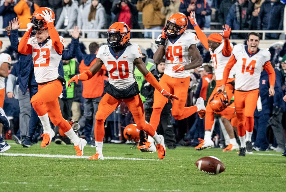 The Illinois bench celebrates their bowl-clinching win Nov. 9, 2019 at Spartan Stadium. The Spartans fell to the Fighting Illini, 37-34.