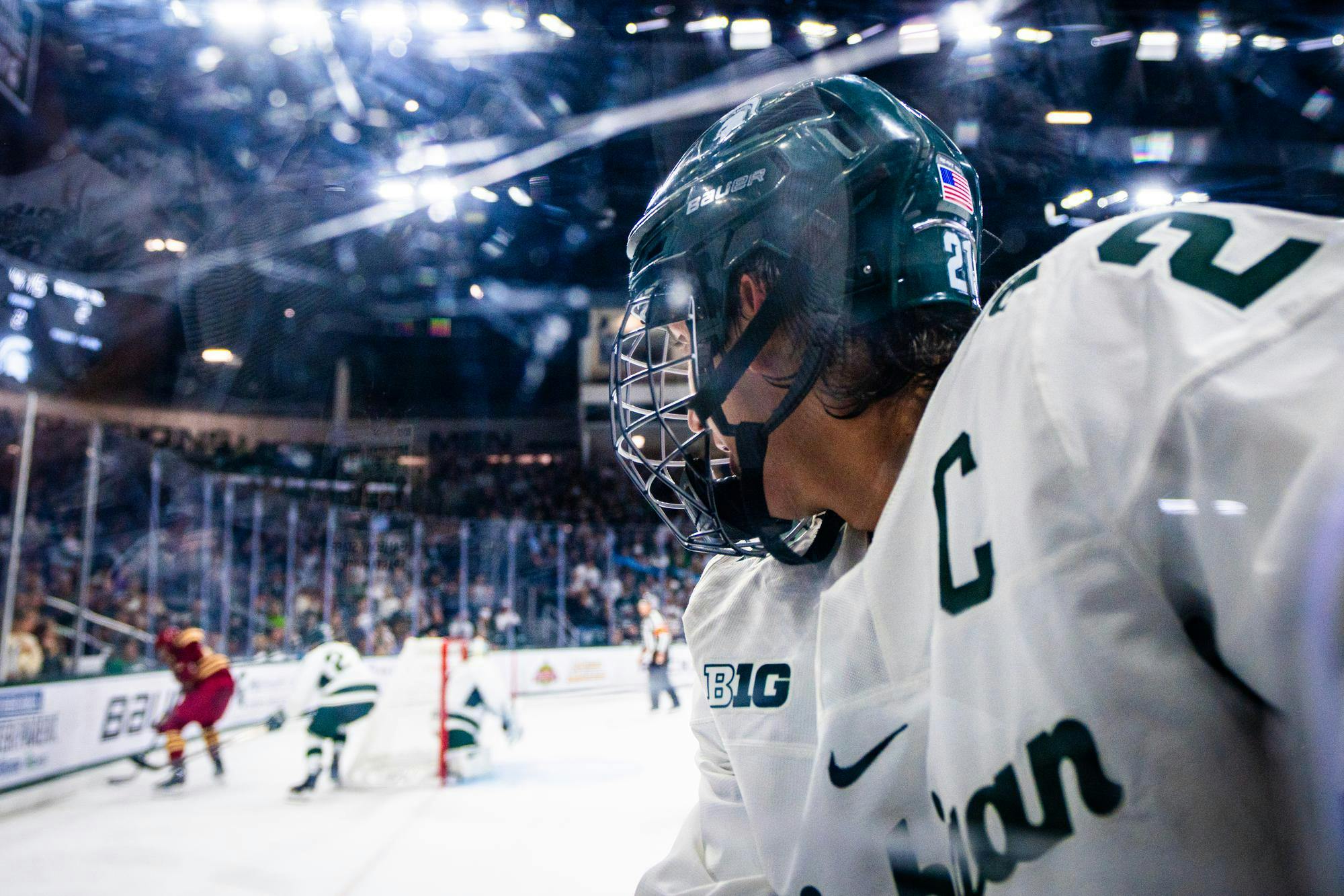 <p>MSU sophomore defenseman Patrick Geary (2) watches a play unfold beside a dasher board during a match at Munn Ice Arena on Oct. 11, 2024.</p>