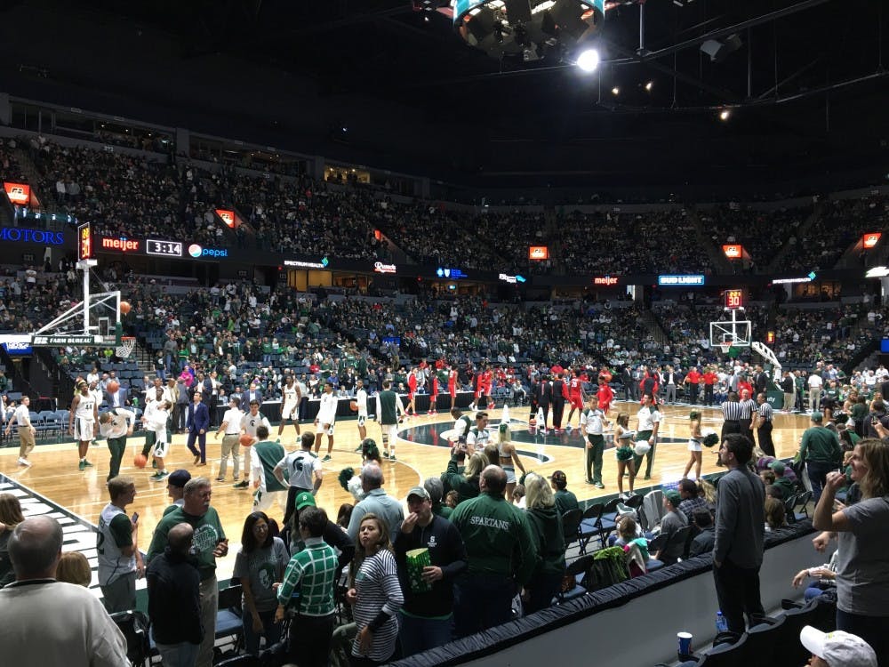 The men's basketball team warms up before it's exhibition game against Georgia.