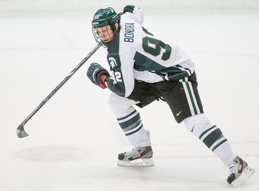 Freshman forward David Bondra skates on the ice during the game against Niagara on Saturday evening, Oct. 20, 2012, at Munn Ice Arena. The Spartans tied the Purple Eagles 3-3. Natalie Kolb/The State News